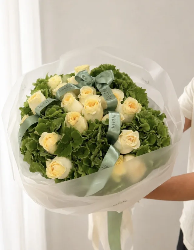Yellow rose and green hydrangea bouquet