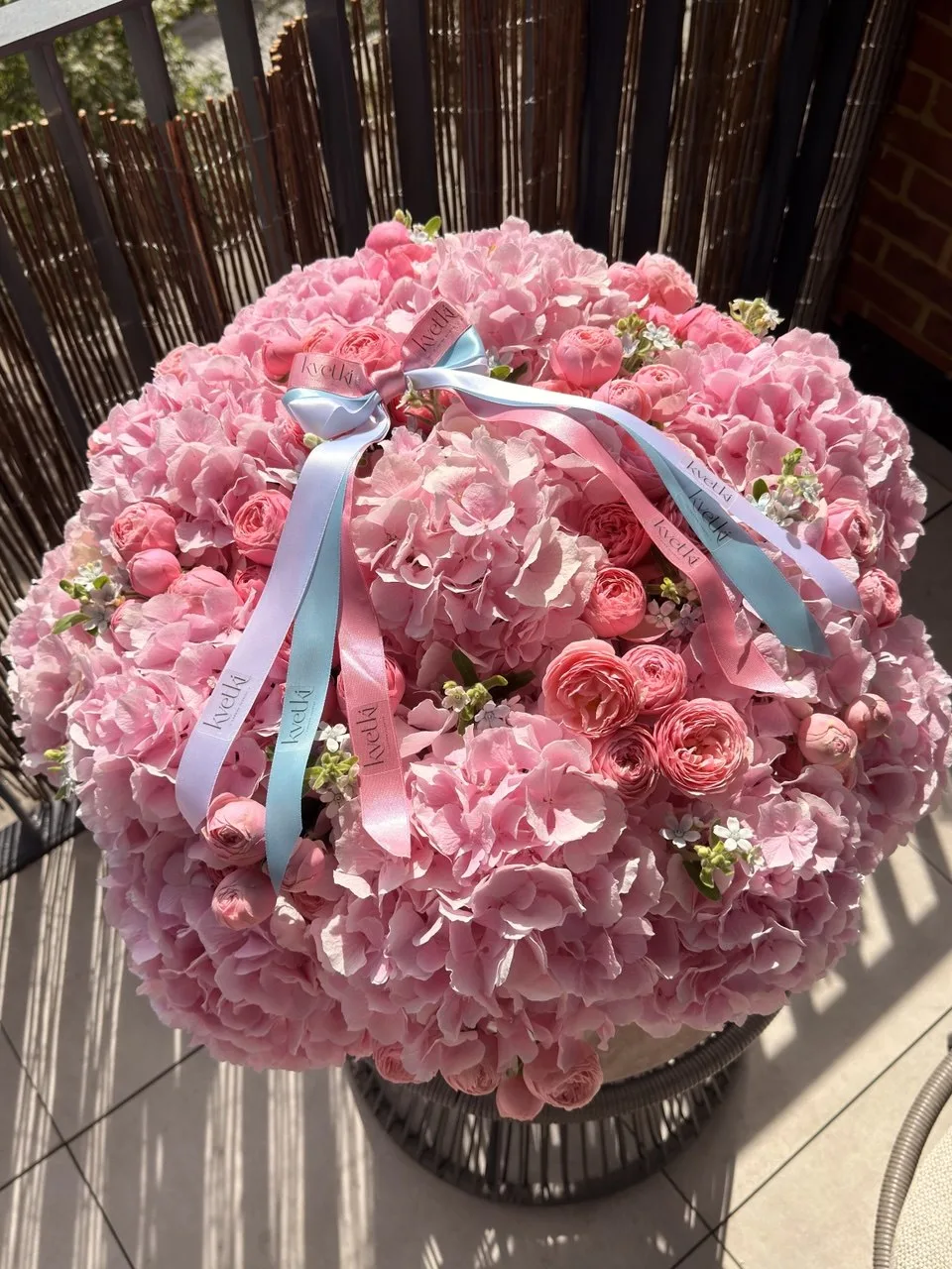 Luxurious pink hydrangea and rose bouquet